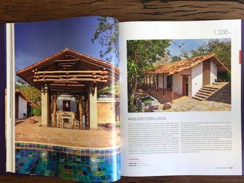 Magazine spread on the house's local architecture, showing the pavilion and mosaic pool